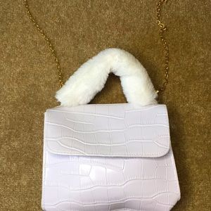 A mini handle croc embossed satchel bag